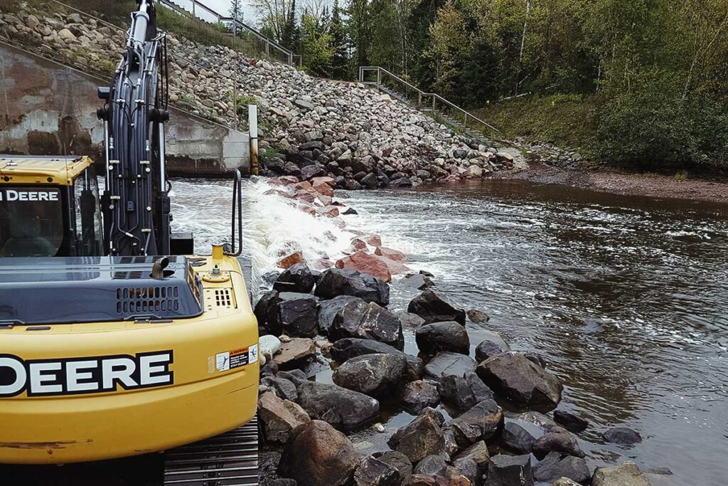 machine near a small waterfall