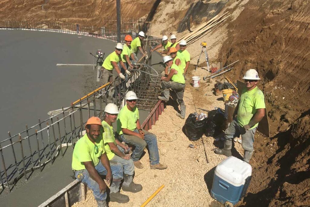 Staabco employees smiling at a job site