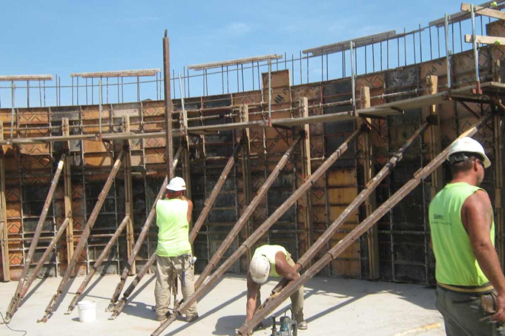 Staabco employees building a wastewater treatment plant