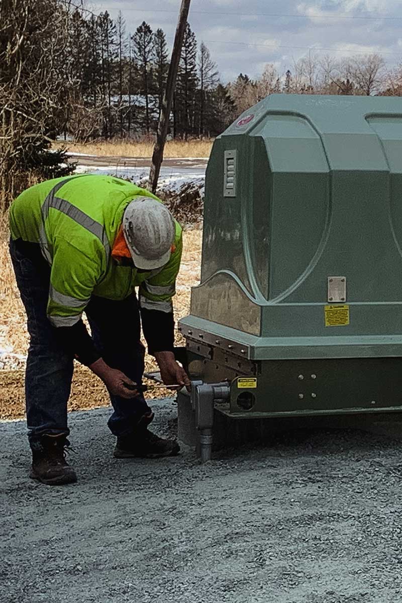 Staab employee screwing in a bolt