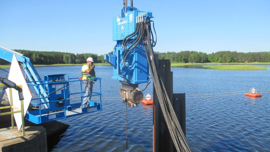 Staab employee working near water