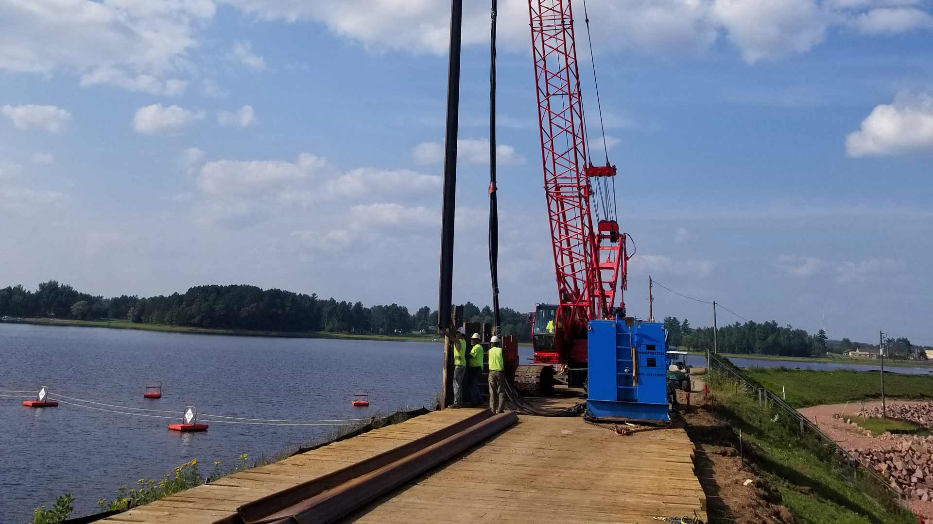 Staab employees working near water