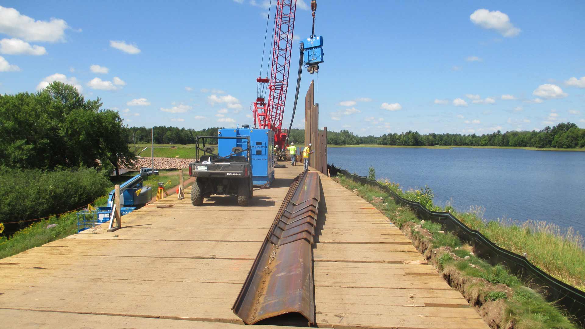 staab employees working near water