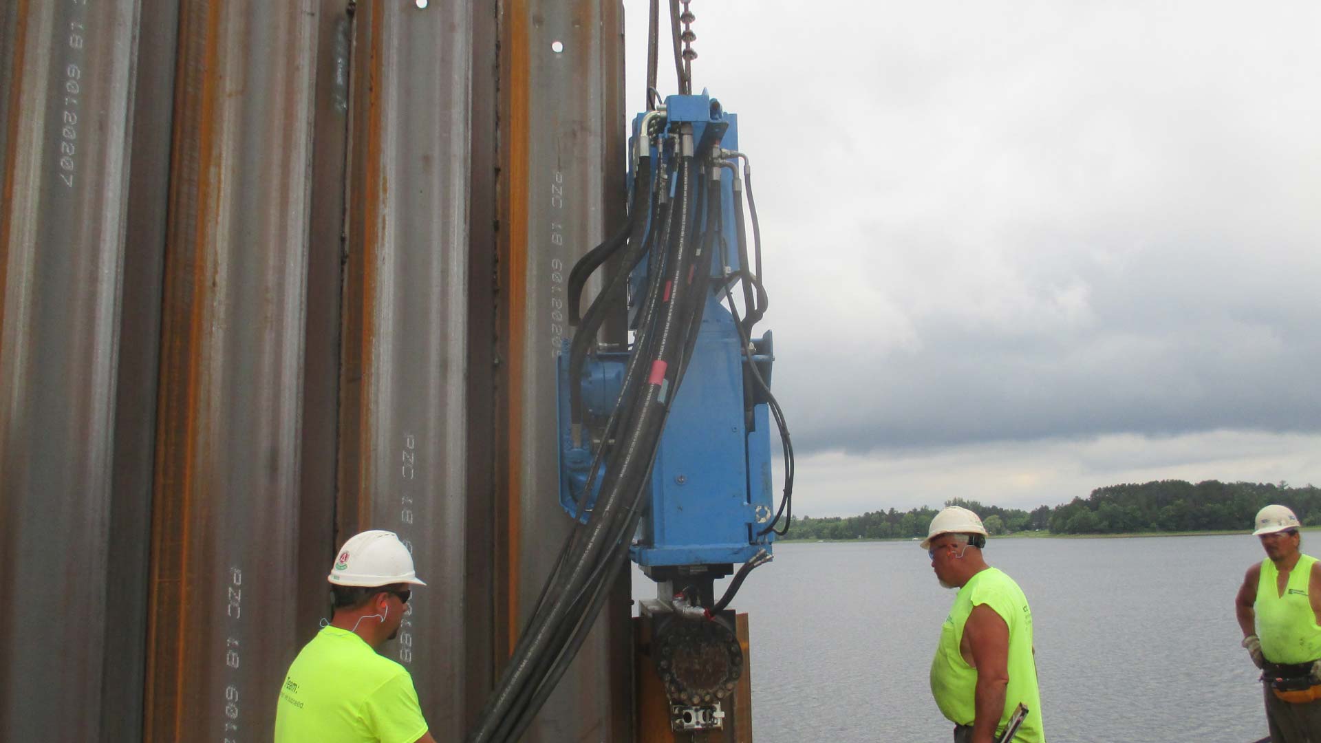 Staab employees working by the water