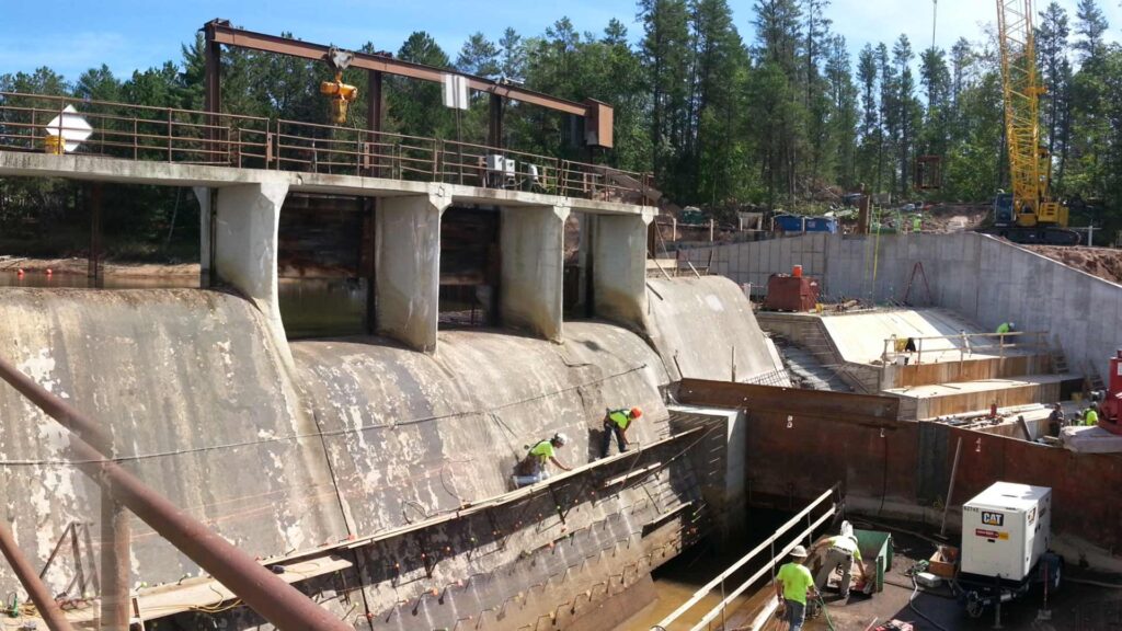 Staab employees working on a dam