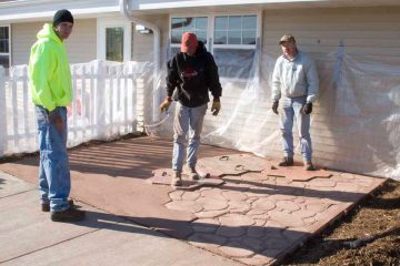 Staab employees working on a patio