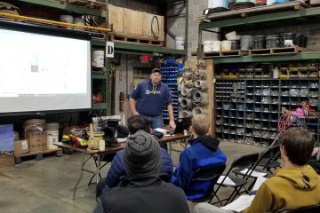 Staab employee giving a presentation to students