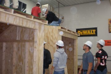 Staab employees showing students building process