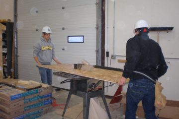 Staab employees showing students building process